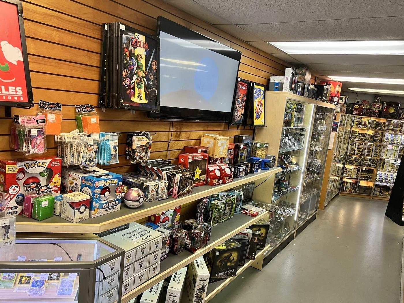 The front counter with collectibles and display cases