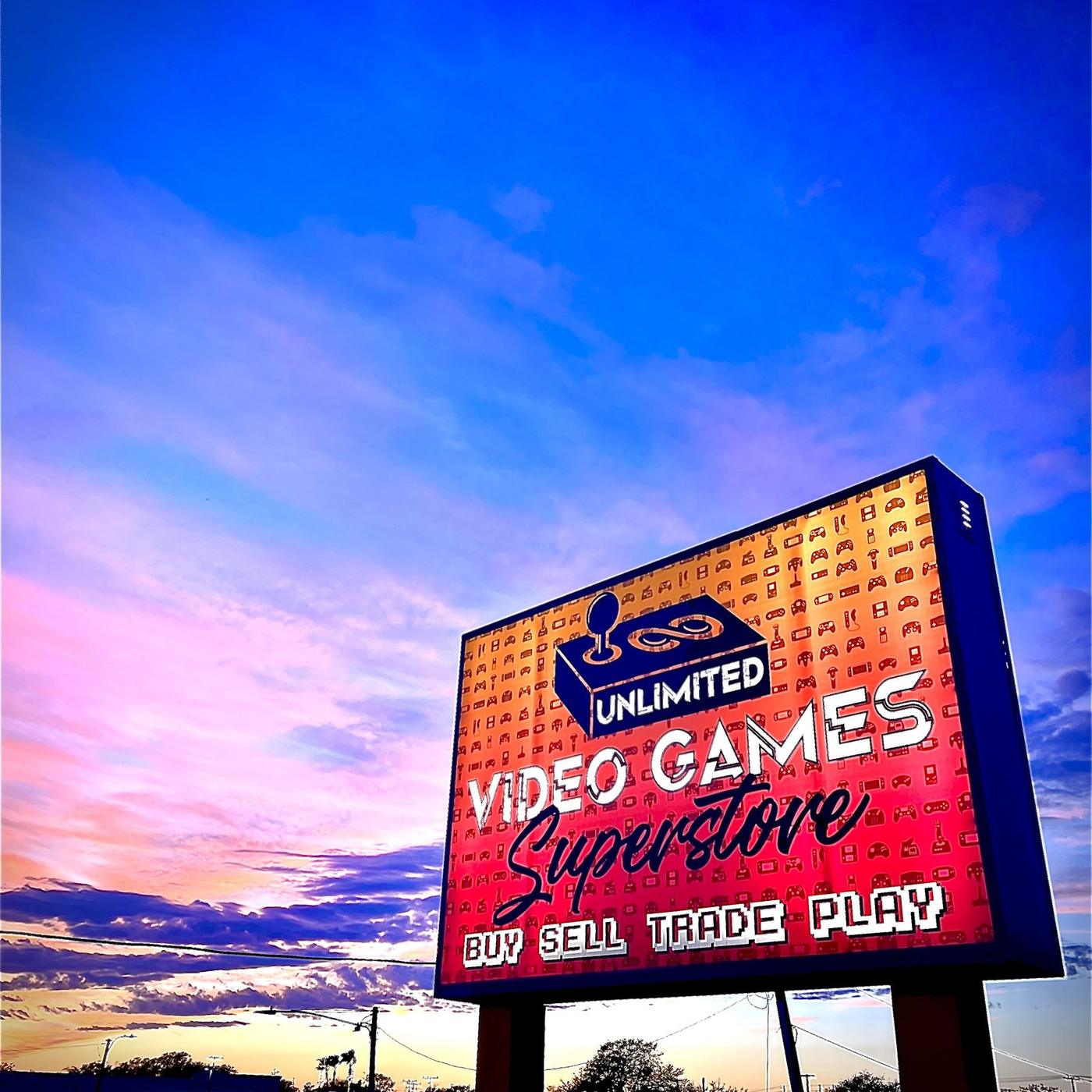 The Unlimited Video Games Superstore sign on US 19 at sunset
